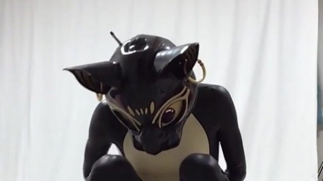 Rubber bastet cums in his latex catsuit with magic wand